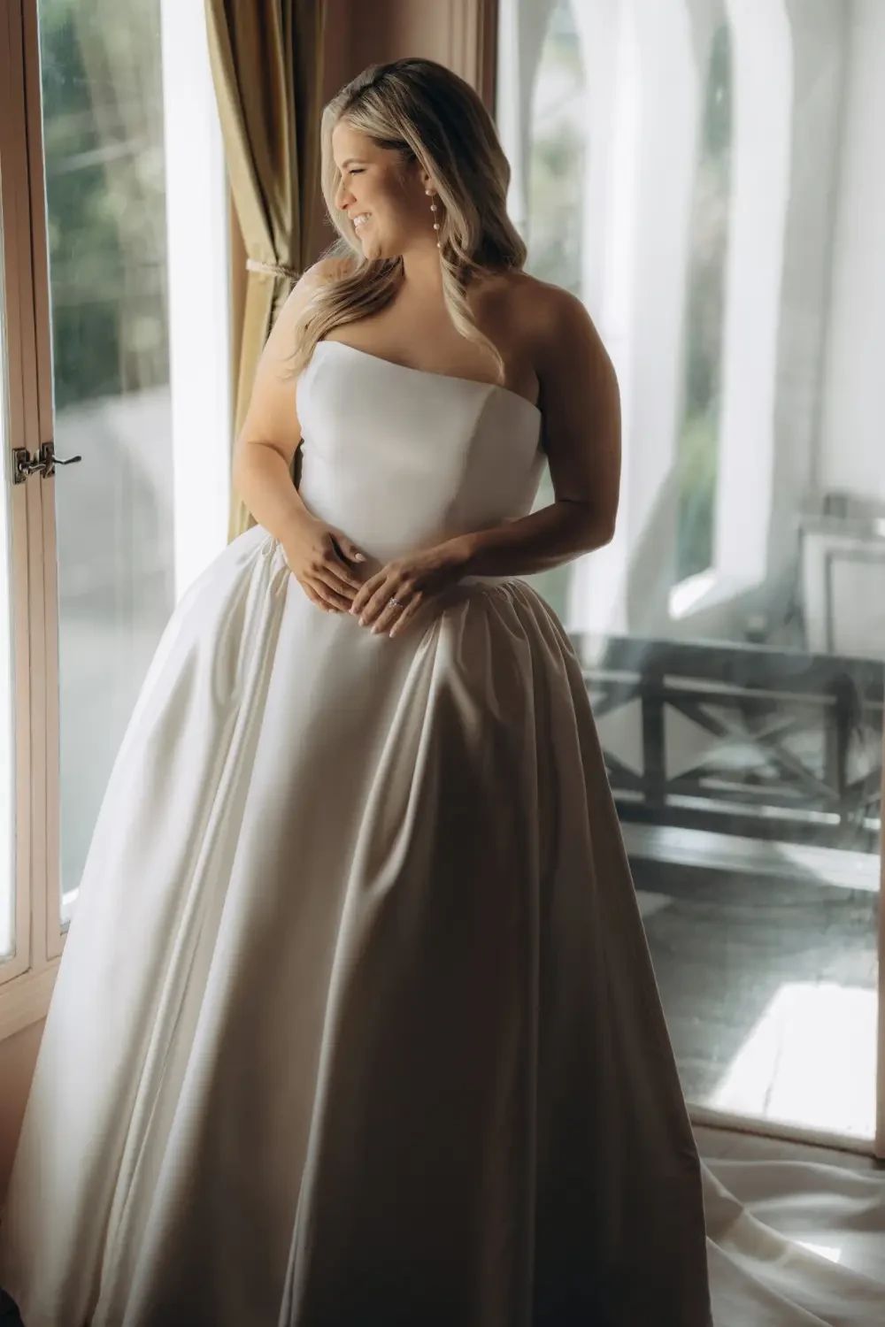 Photo of the model wearing a bridal gown